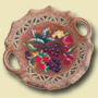 e ceramiche di Angelao Occhipinti - centrotavola uva e frutta mista